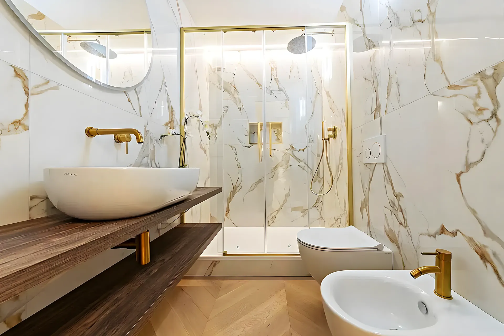 Reforma de baño en mármol con grifería dorada — Sitges