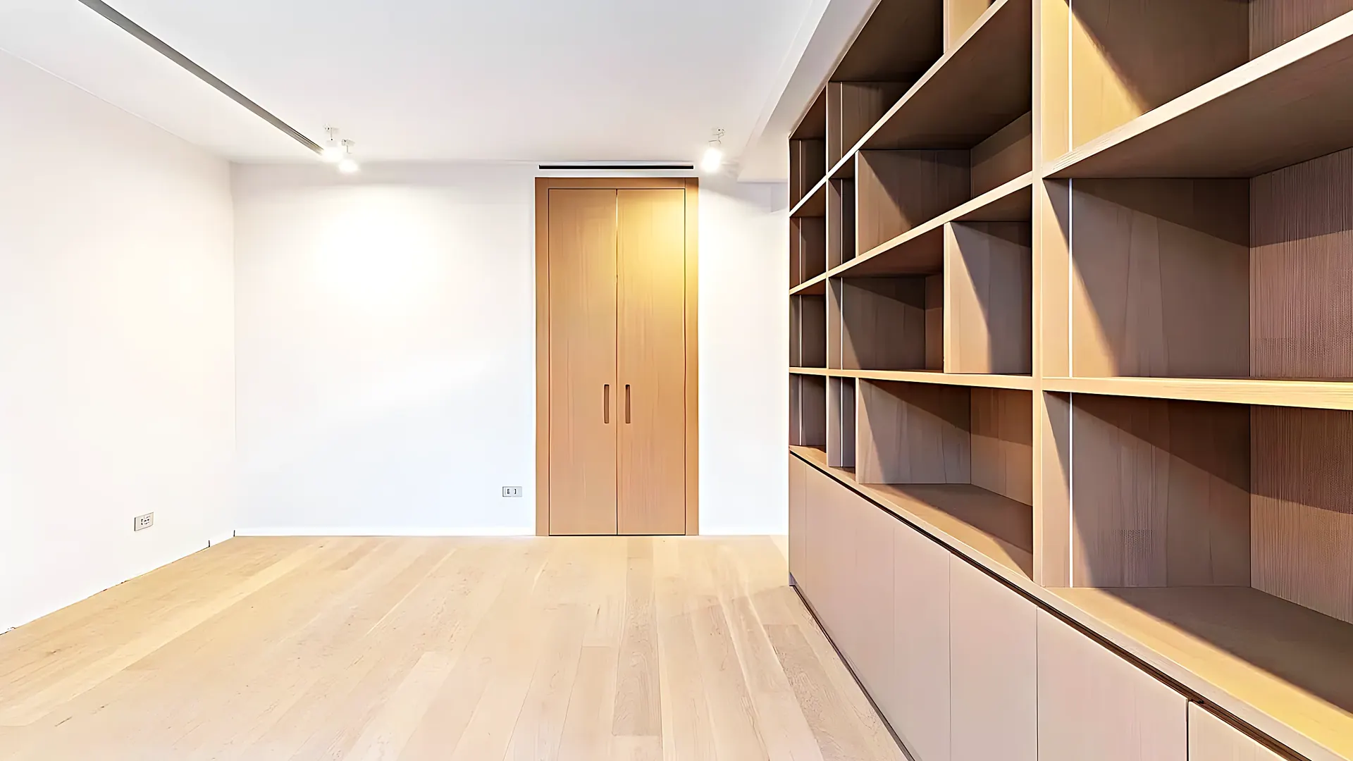 Librería a medida de suelo a techo — interiorismo en Sitges